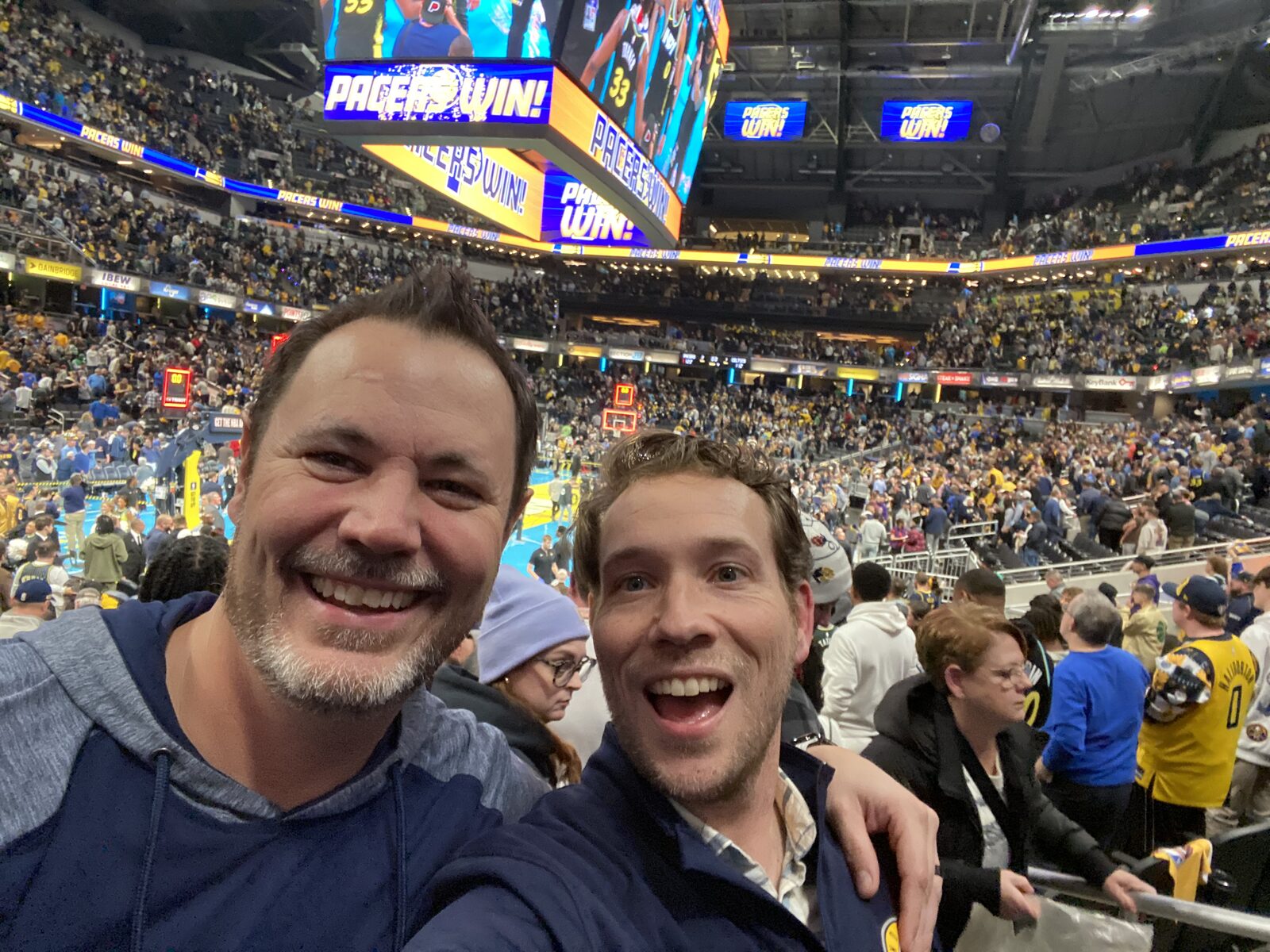 Tim Flint celebrating a Pacers win with a friend